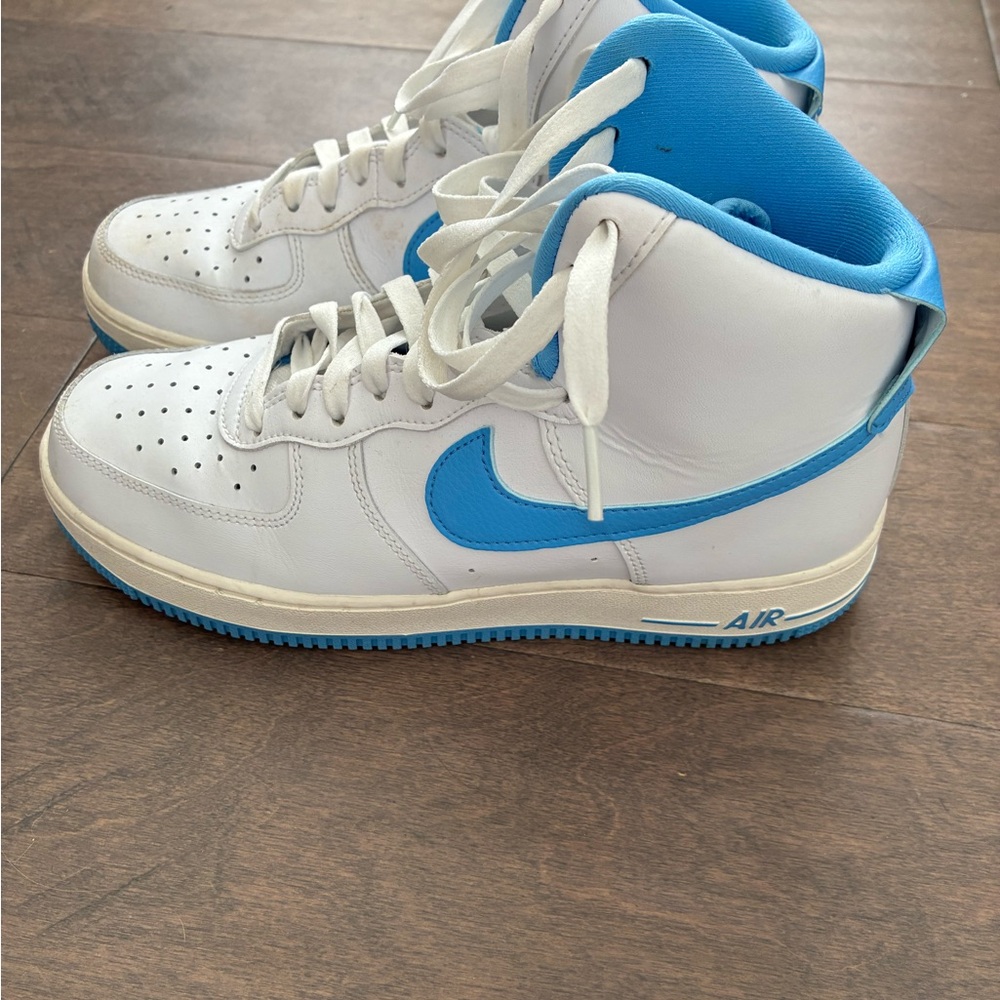 Nike Woman’s White and Blue Sneakers